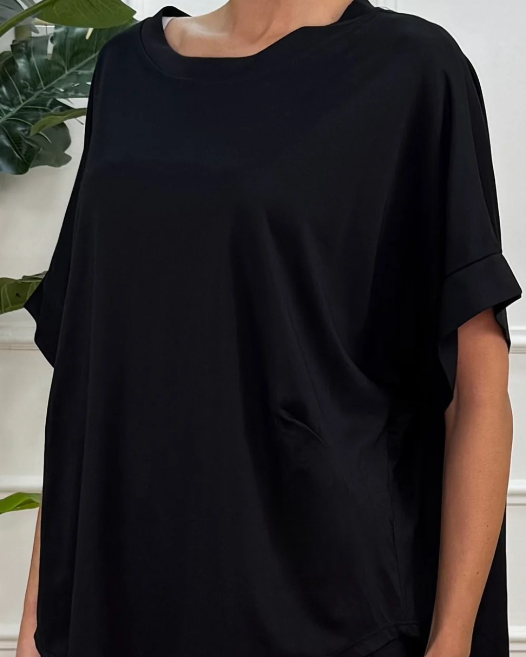 Conjunto de camisa e calças largas para mulher