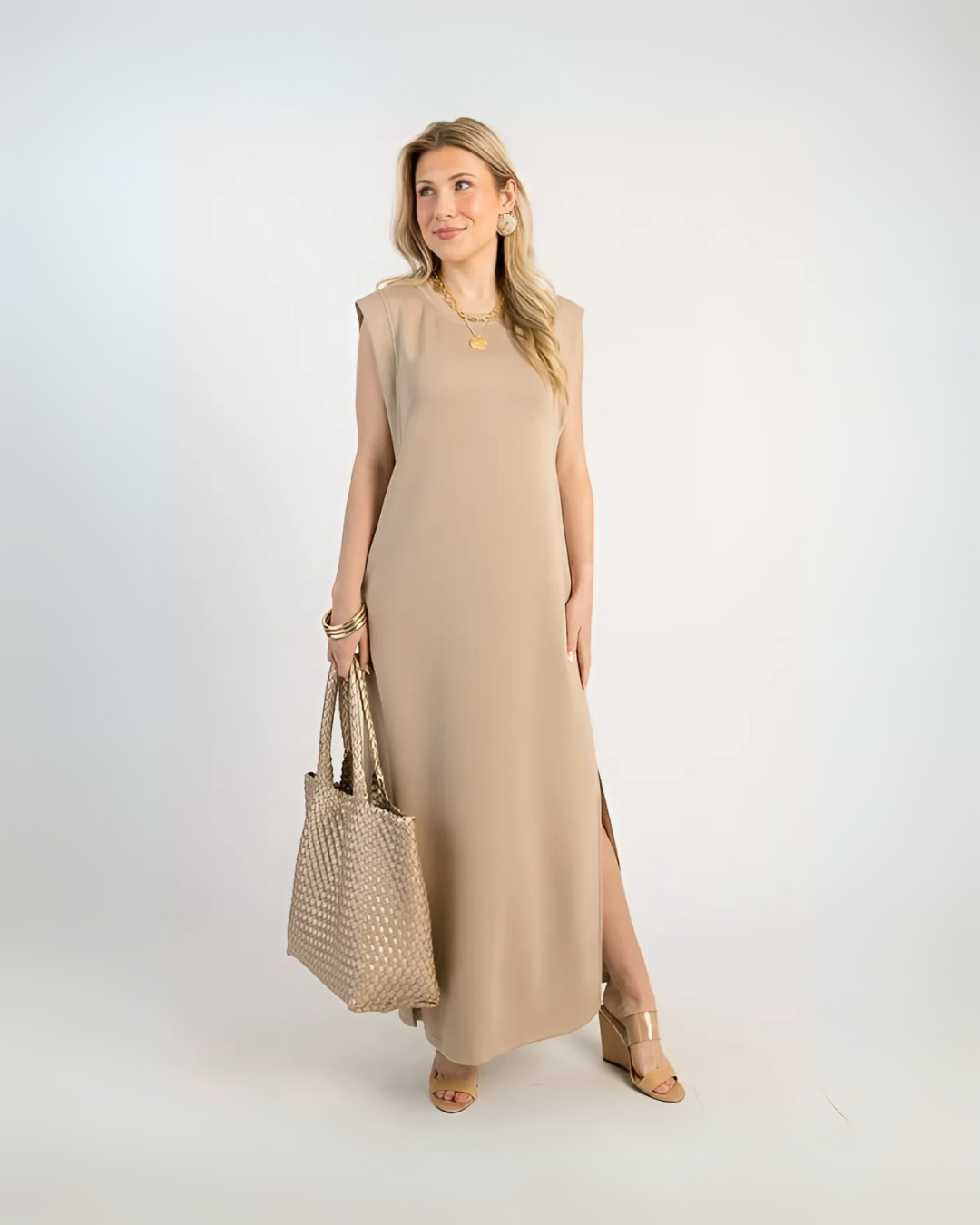 Vestido comprido e solto com bolsos laterais
