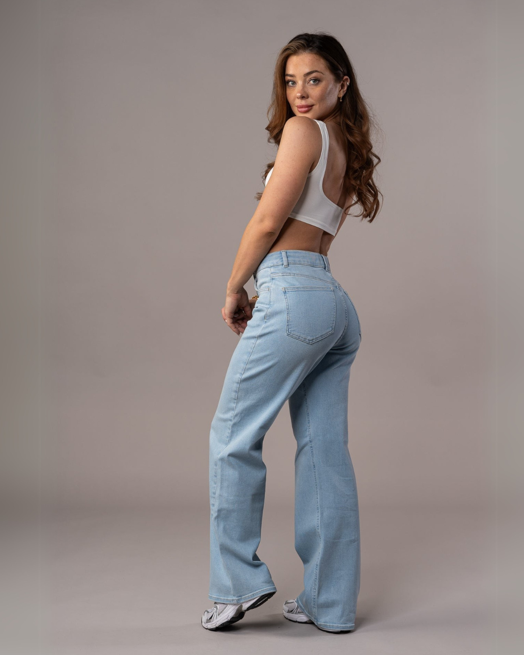 Calças de Cintura Alta com um Corte Alongado para Mulher