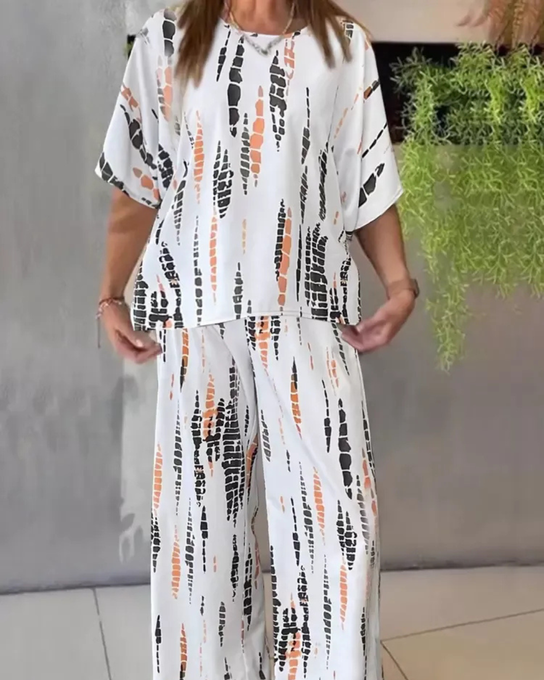 Conjunto casual de duas peças para mulher com estilo boémio e gola redonda