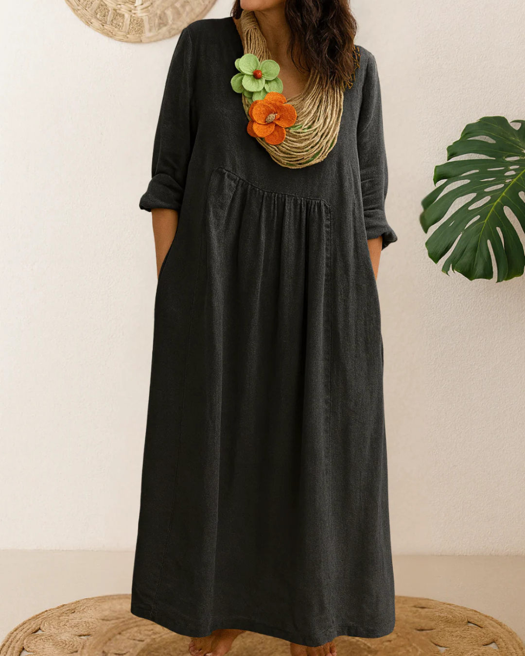 Vestido longo de linho com gola redonda e bolsos