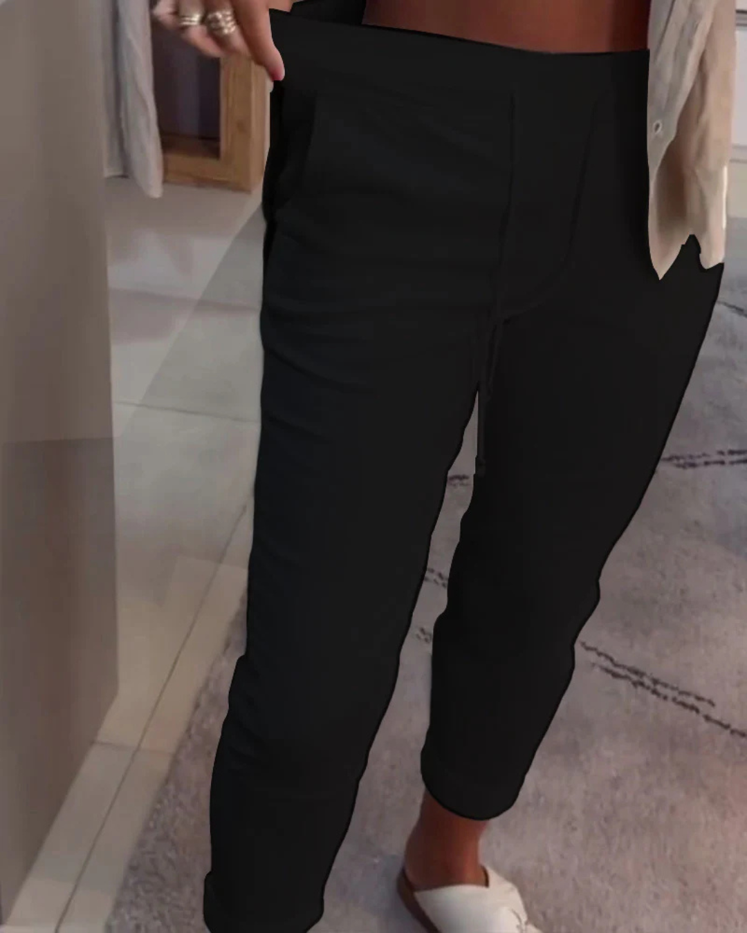 Calças largas com ajuste elástico para mulher