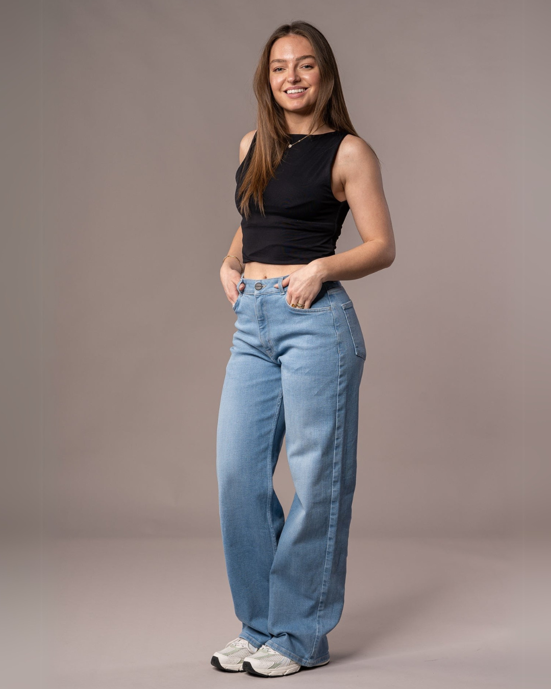 Calças de Cintura Alta com um Corte Alongado para Mulher