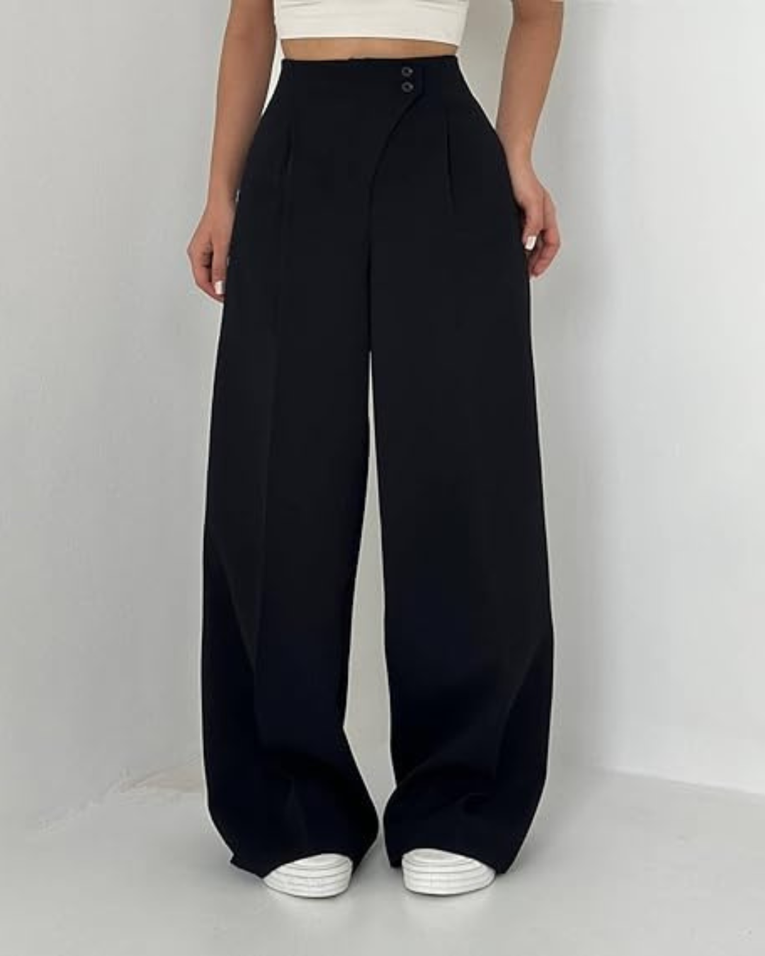 Calças elegantes de cintura alta para mulher