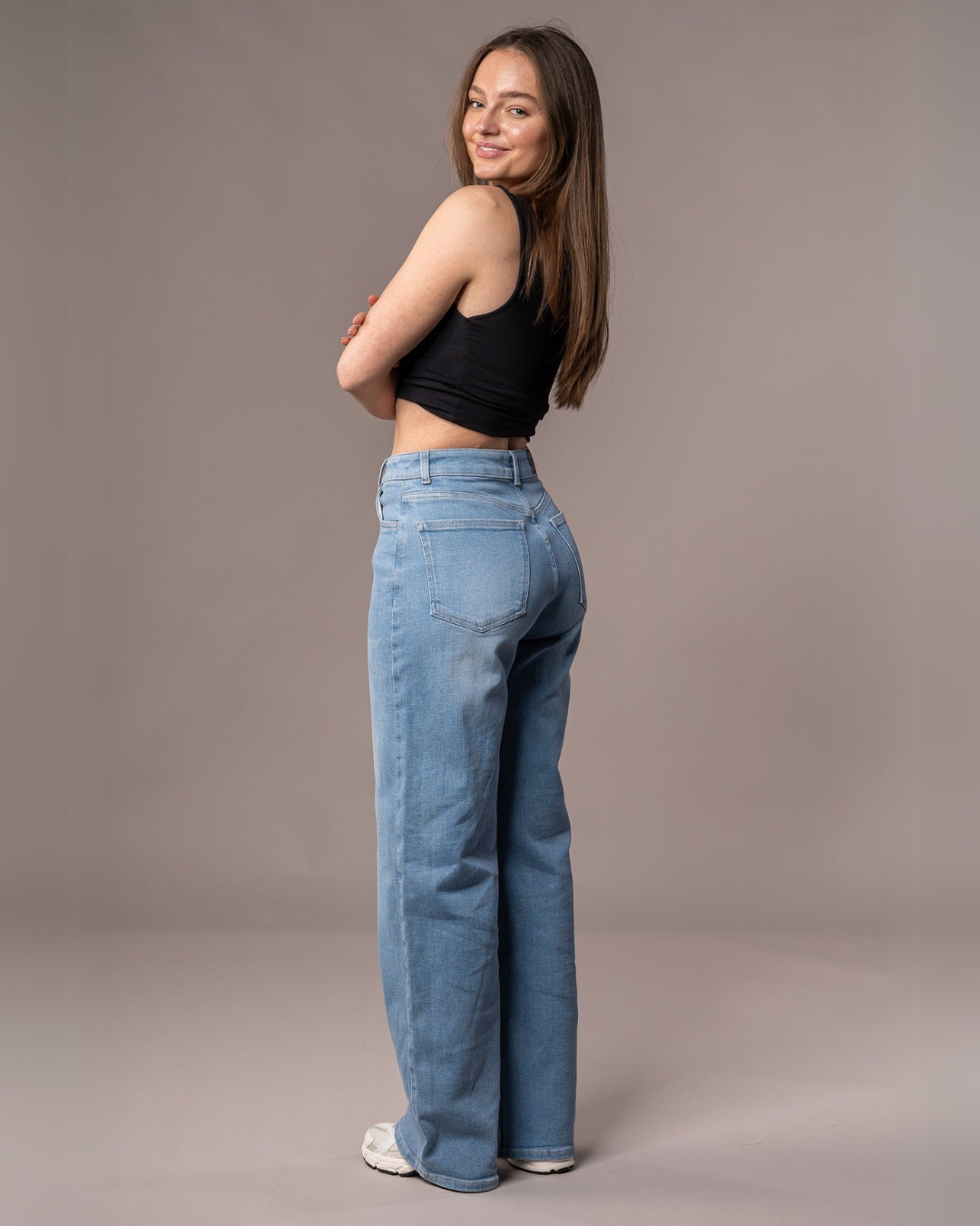 Calças de Cintura Alta com um Corte Alongado para Mulher