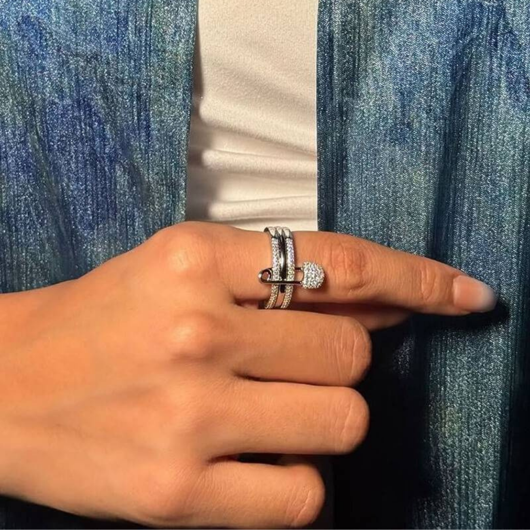 Anel de banda brilhante com alfinete decorativo