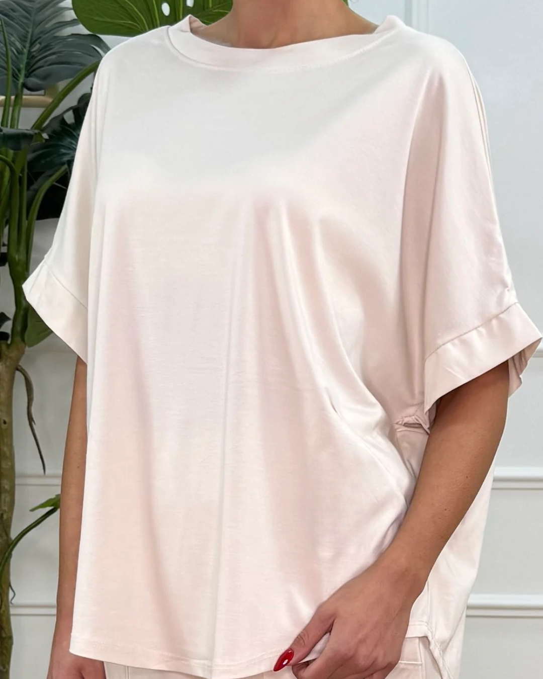 Conjunto de camisa e calças largas para mulher