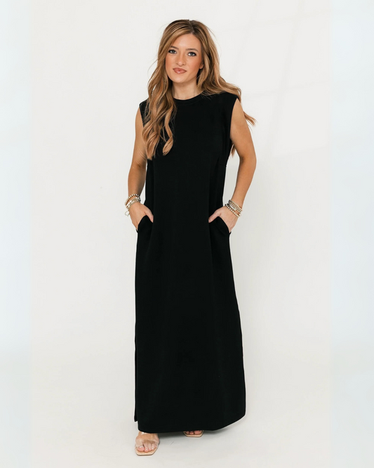 Vestido comprido e solto com bolsos laterais