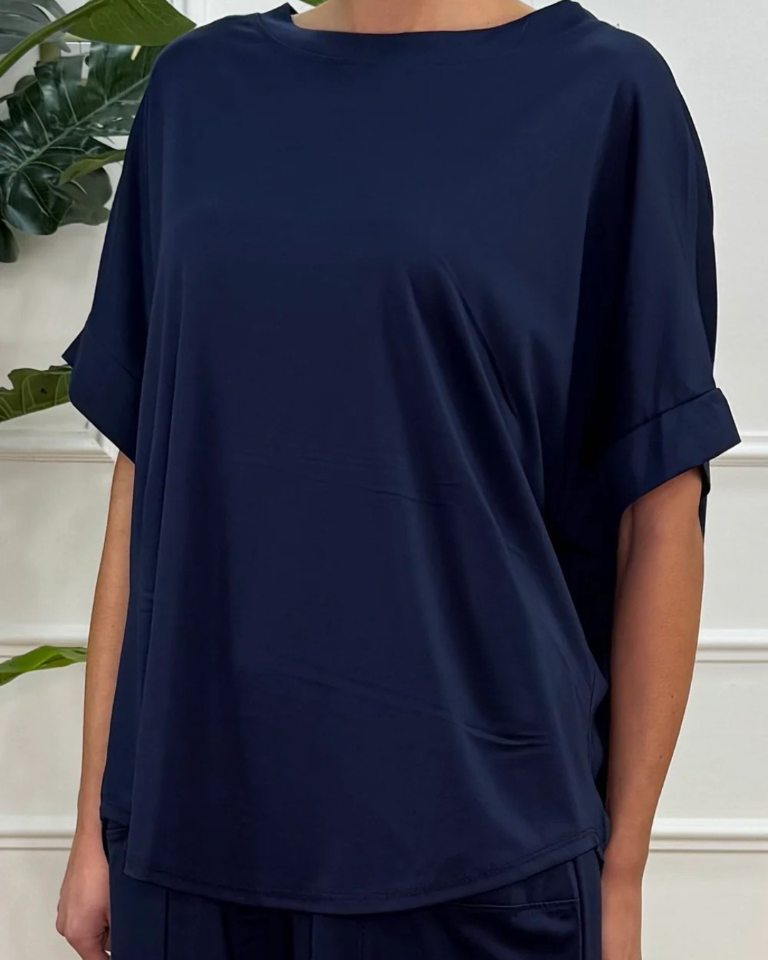 Conjunto de camisa e calças largas para mulher