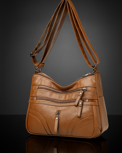 Bolsa com vários compartimentos e textura suave