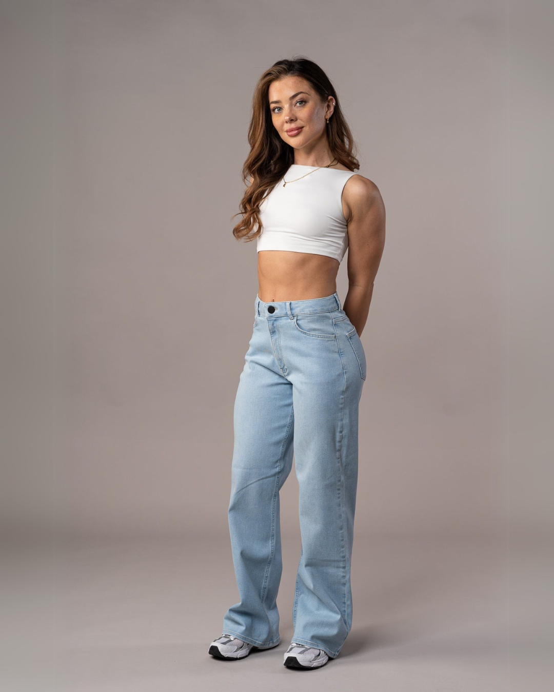 Calças de Cintura Alta com um Corte Alongado para Mulher