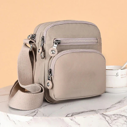 Bolsa leve com design multi-compartimentos