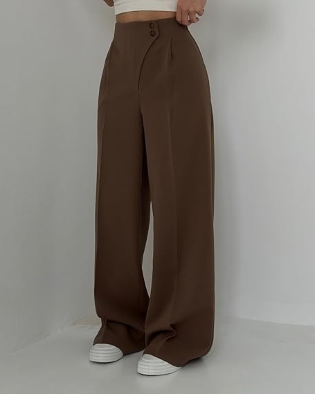 Calças elegantes de cintura alta para mulher