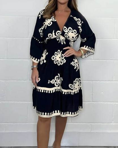 Vestido largo estampado com decote em V