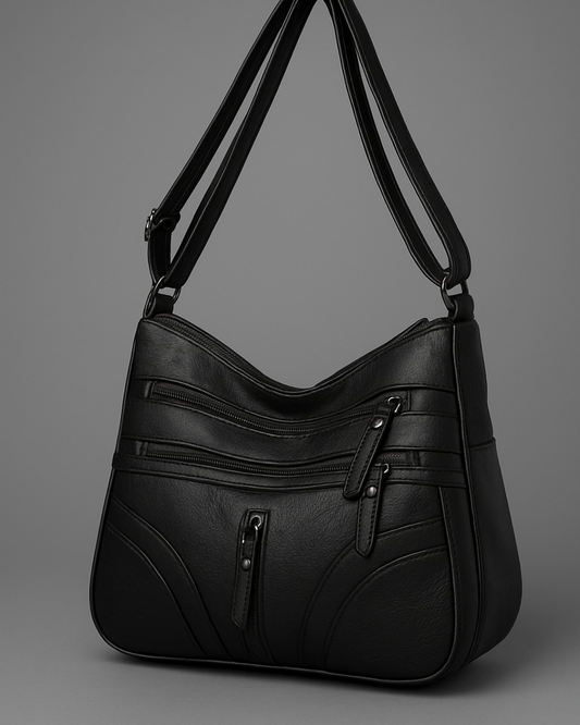 Bolsa com vários compartimentos e textura suave