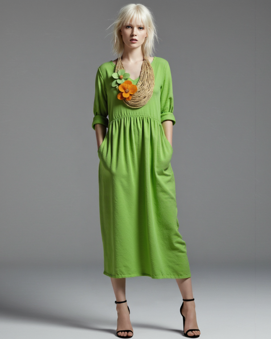 Vestido longo de linho com gola redonda e bolsos