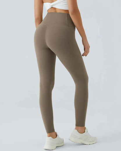 Leggings Modeladoras de Cintura Subida com Bolsos Laterais Controlo da Barriga e Aumento das Nádegas
