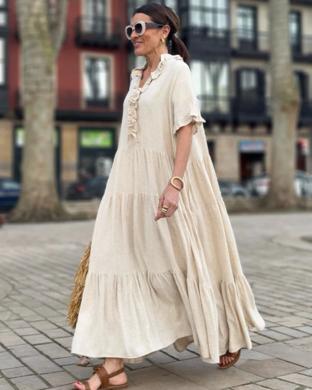 Vestido longo de linho, com ajuste no meio