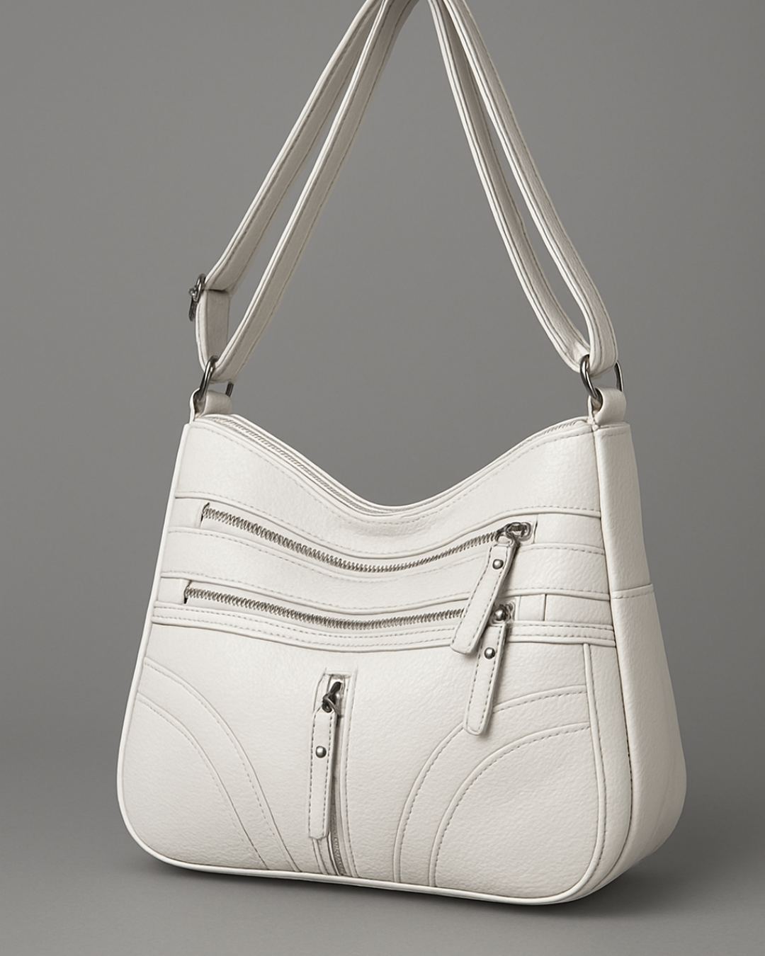 Bolsa com vários compartimentos e textura suave