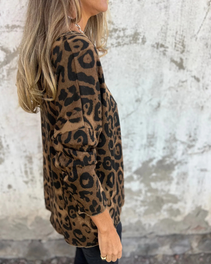 Blusa Elástica para Mulher com Estampado Animal e Decote Redondo