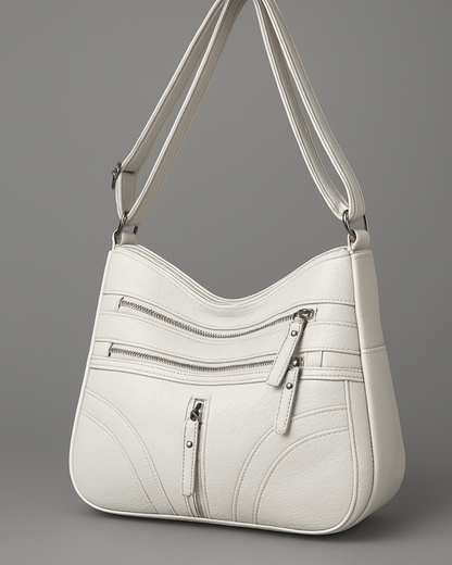 Bolsa com vários compartimentos e textura suave