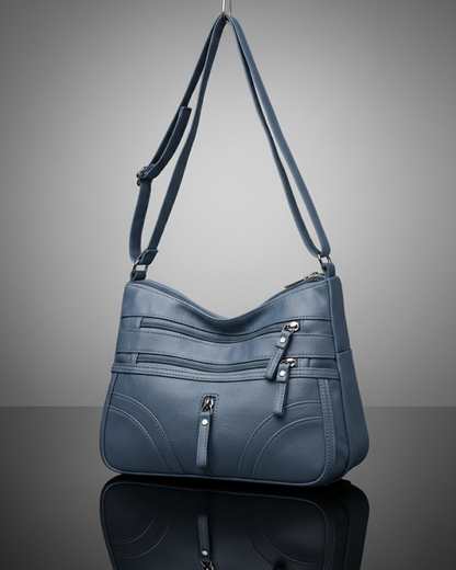 Bolsa com vários compartimentos e textura suave