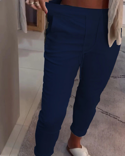 Calças largas com ajuste elástico para mulher