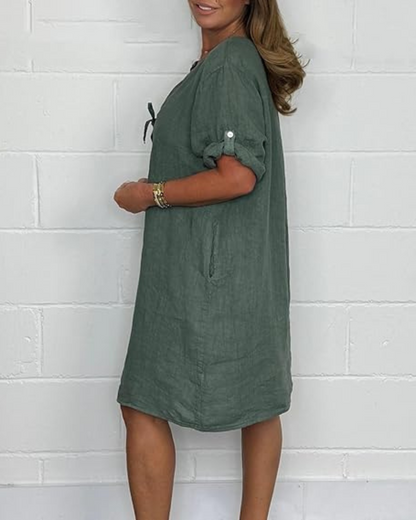 Vestido de linho com mangas compridas e botões elegantes