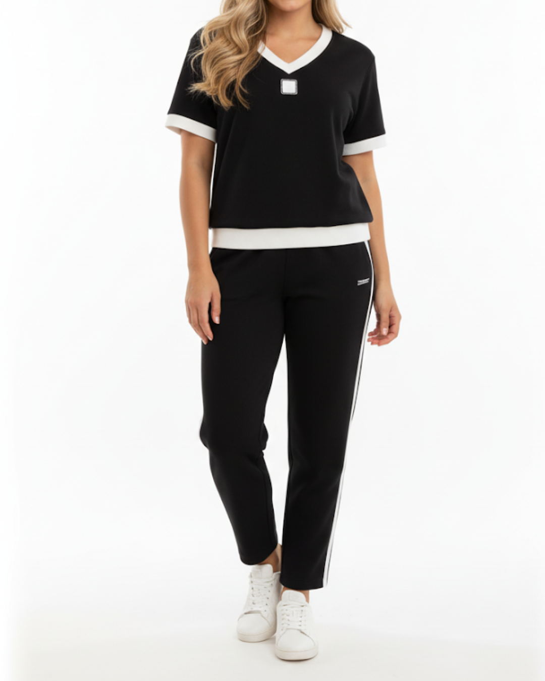 Conjunto elegante de top e calças com decote em V