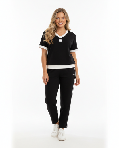 Conjunto elegante de top e calças com decote em V